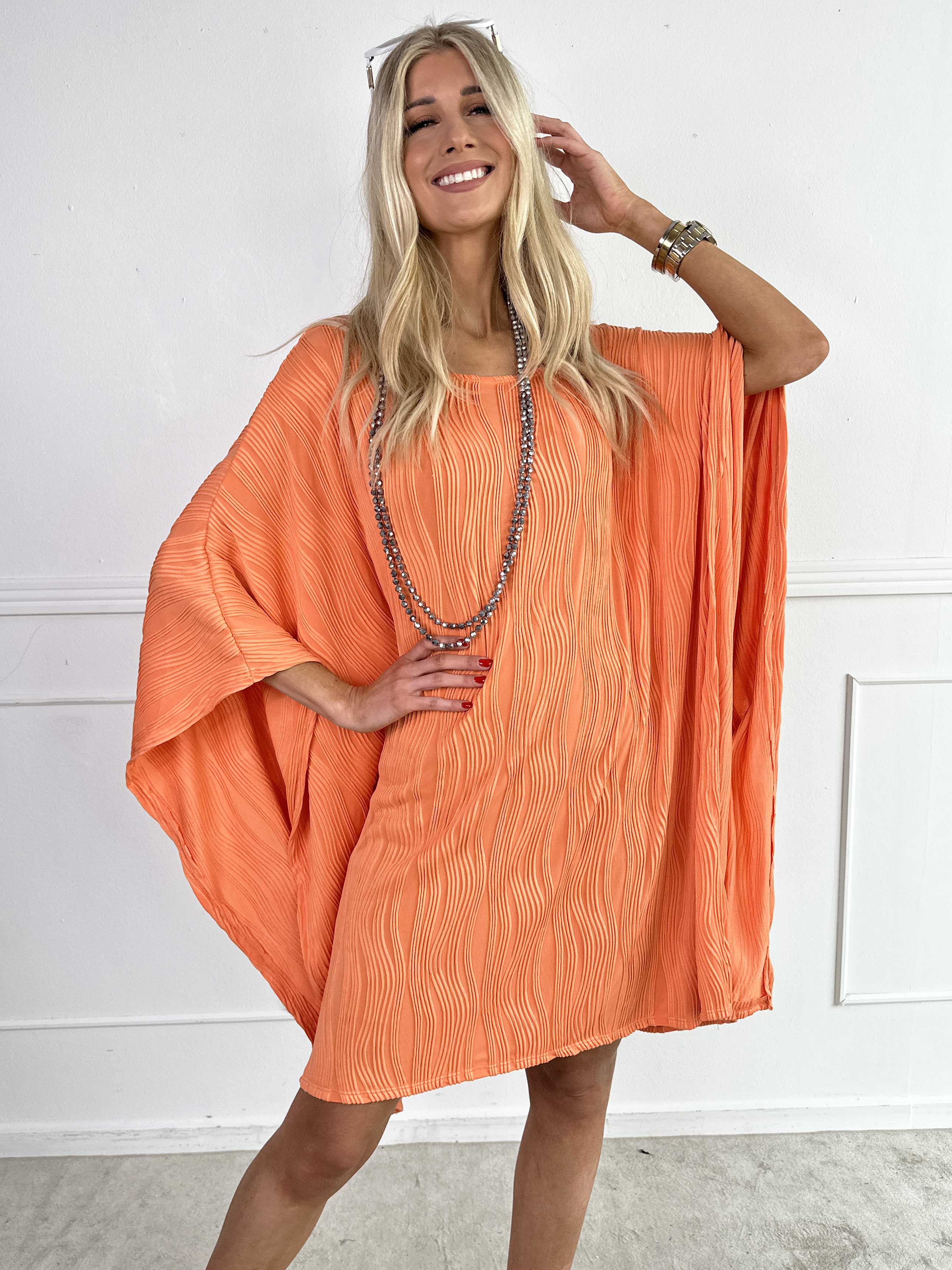 Kaja - Elastisk tunika i blødt rillet stof